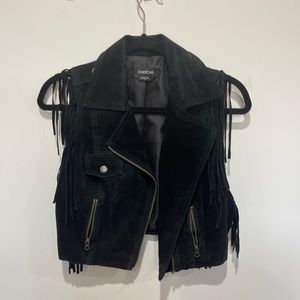 Black suede BEBE vest with fringes.size small, a drop cropped style.